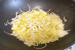 sliced garlic added to sauteed onions