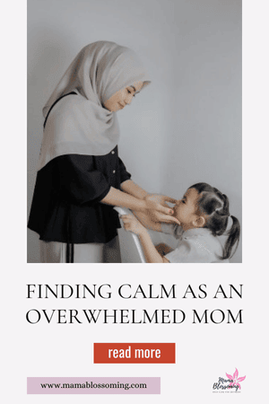 Muslim mother holding her child and finding calm in motherhood
